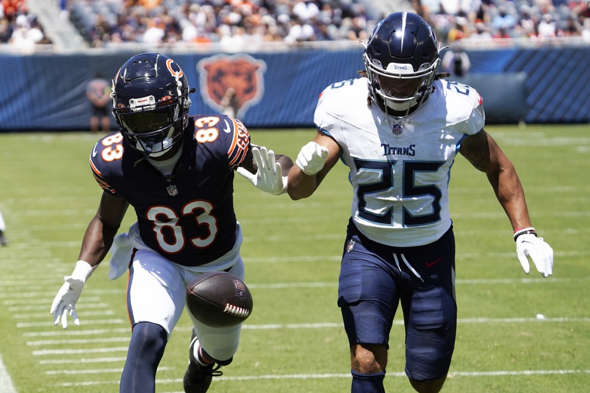 Titans' cornerback Armani Marsh (25) defends Chicago Bears wide receiver Nsimba Webster (83) during the second quarter at Soldier Field. 