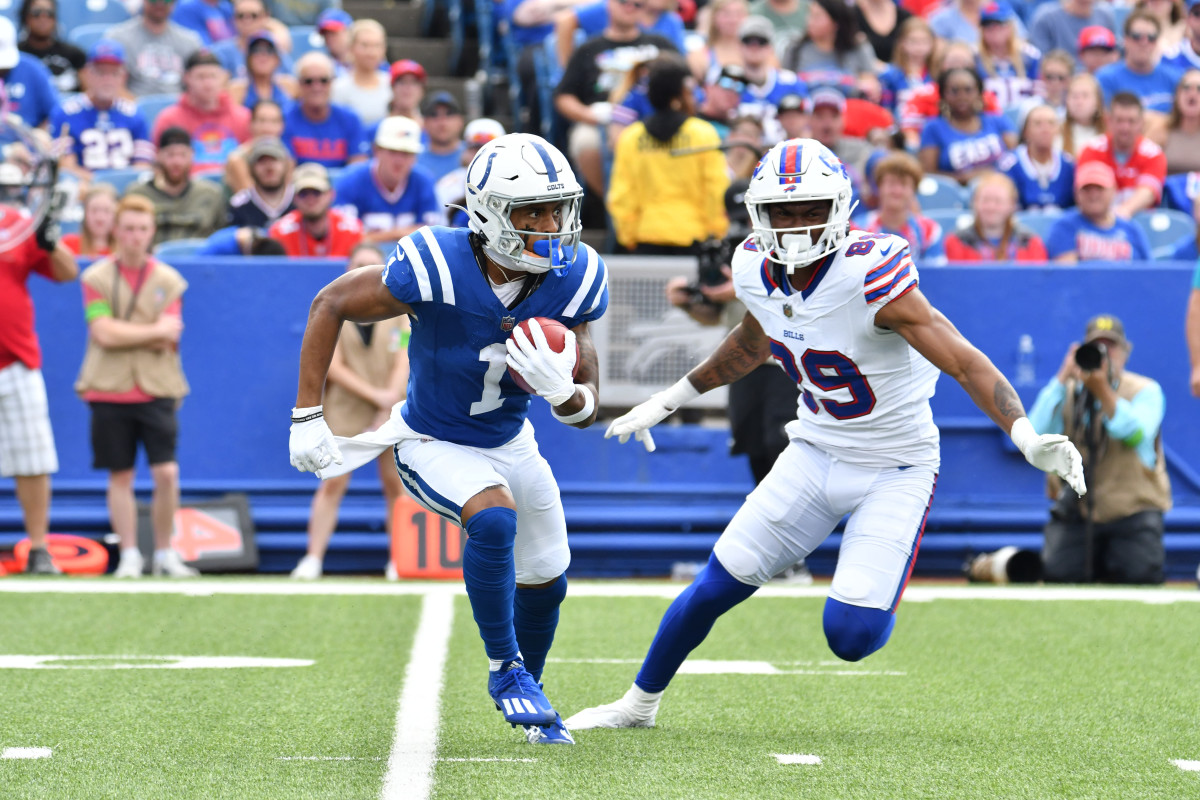 Aug 12, 2023; Orchard Park, New York, USA; Indianapolis Colts wide receiver Josh Downs (1) returns a kickoff against Buffalo Bills wide receiver Bryan Thompson (89) in the third quarter of a pre-season game at Highmark Stadium. Mandatory Credit: Mark Konezny-USA TODAY Sports