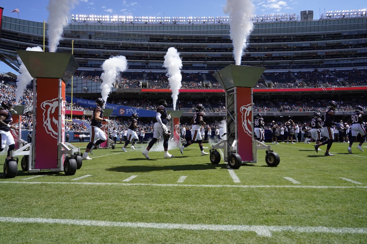 Chicago Bears take the field against the Tennessee Titans at Soldier Field.