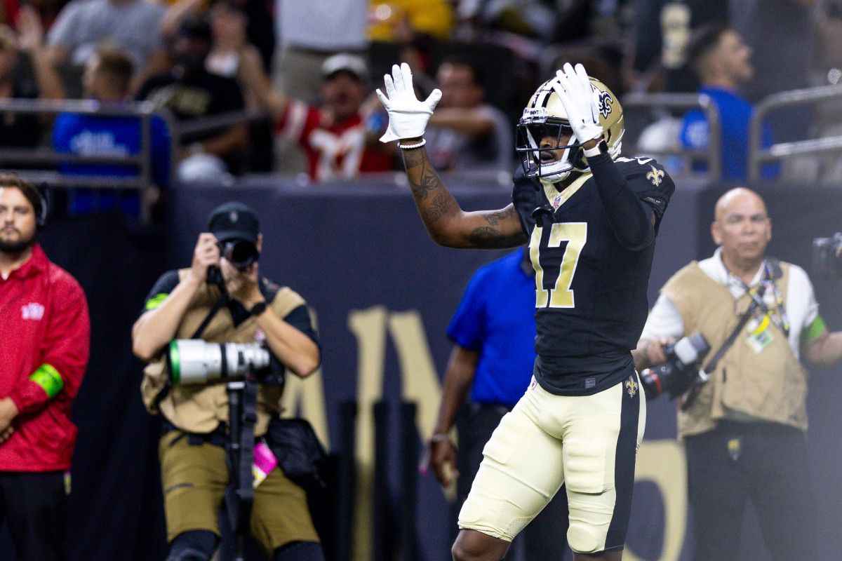 A.T. Perry (17) reacts after falling at the goal line for a touchdown reception