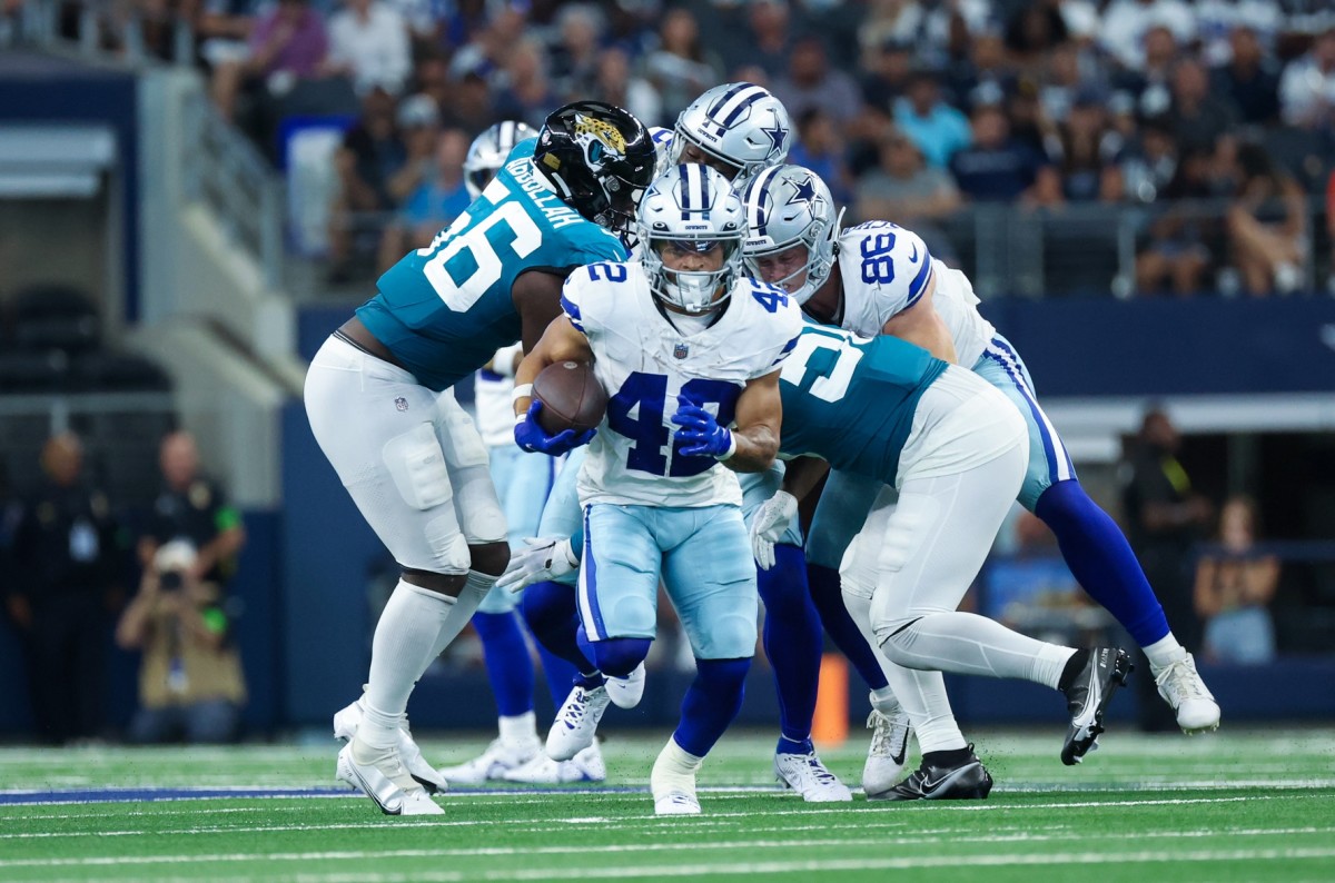 Former Kansas State running back Deuce Vaughn carried eight times for 50 yards and a score for the Cowboys in his preseason debut.