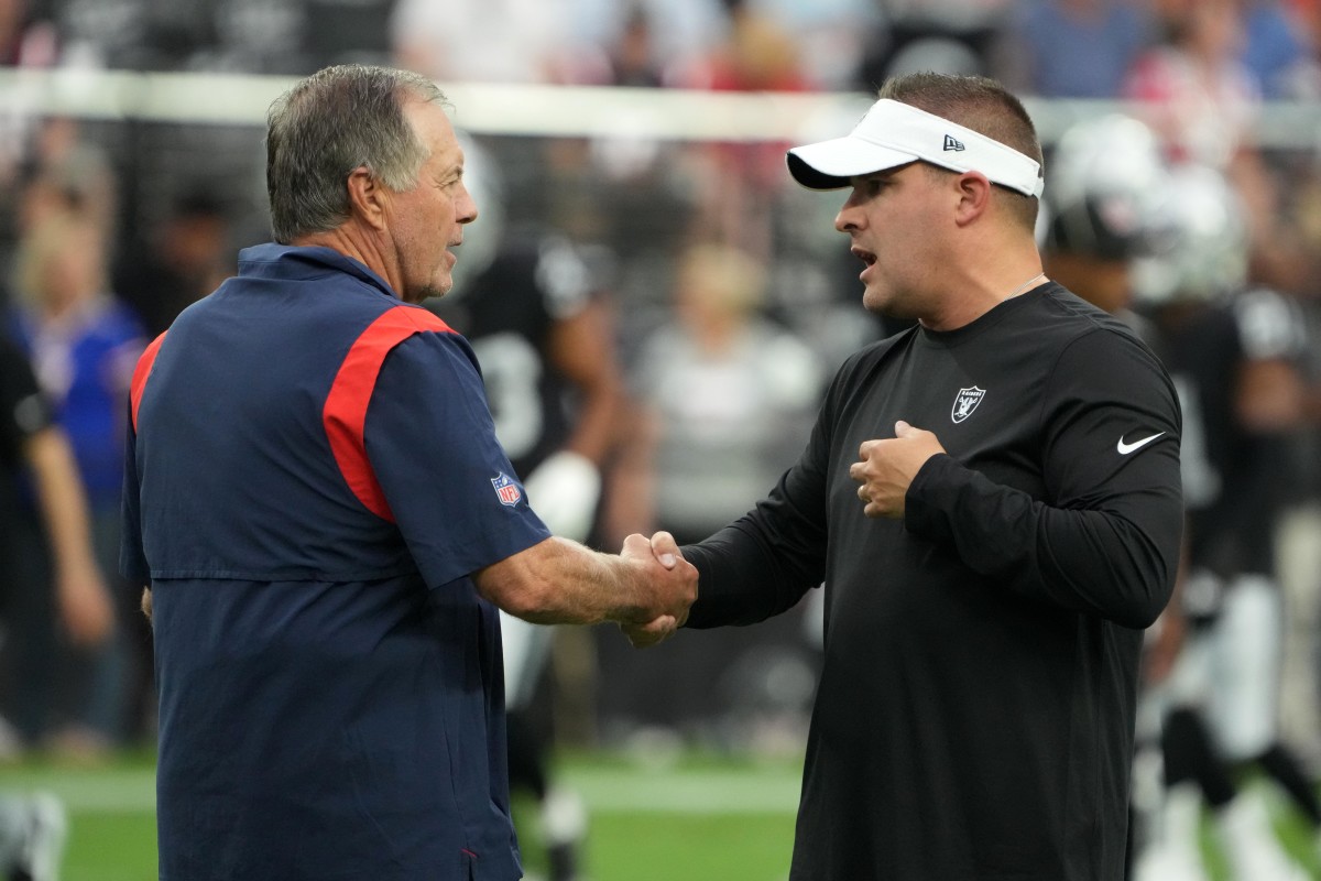 Josh McDaniels and Bill Belichick shake hands