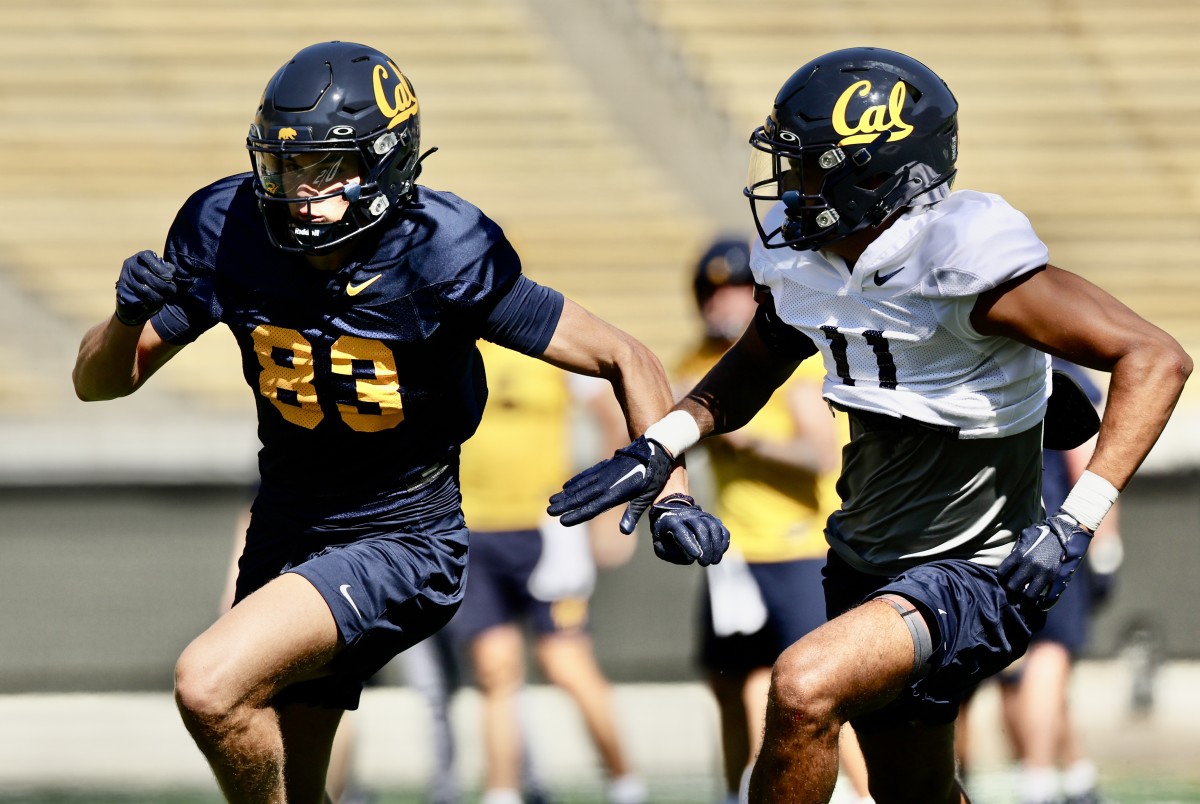 Cal receiver Trond Grizzell (83) works against defensive back Tyson McWilliams.