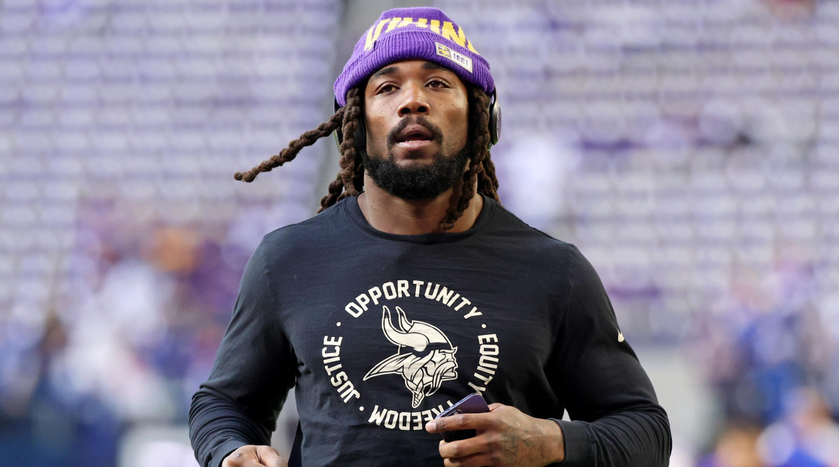 Vikings running back Dalvin Cook warms up before a game