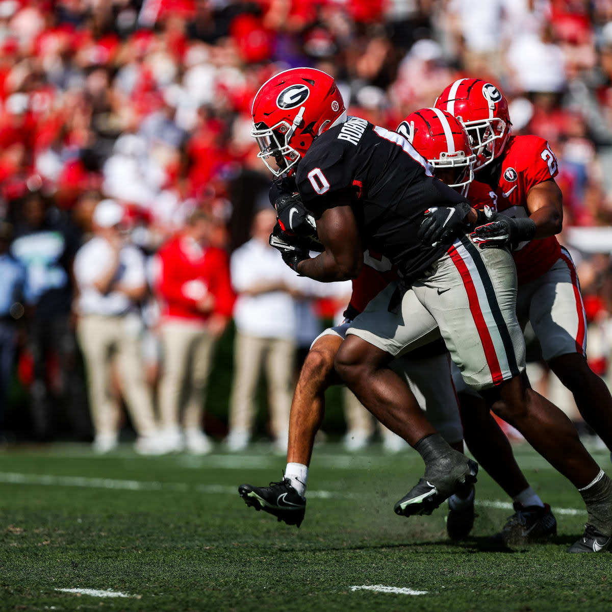 Georgia freshman running back Roderick Robinson carries tacklers during Georgia's 2023 "G-Day" spring game. Robinson has impressed since arriving on campus and is in line to receive carries early in the season. Photo VIA Tony Walsh