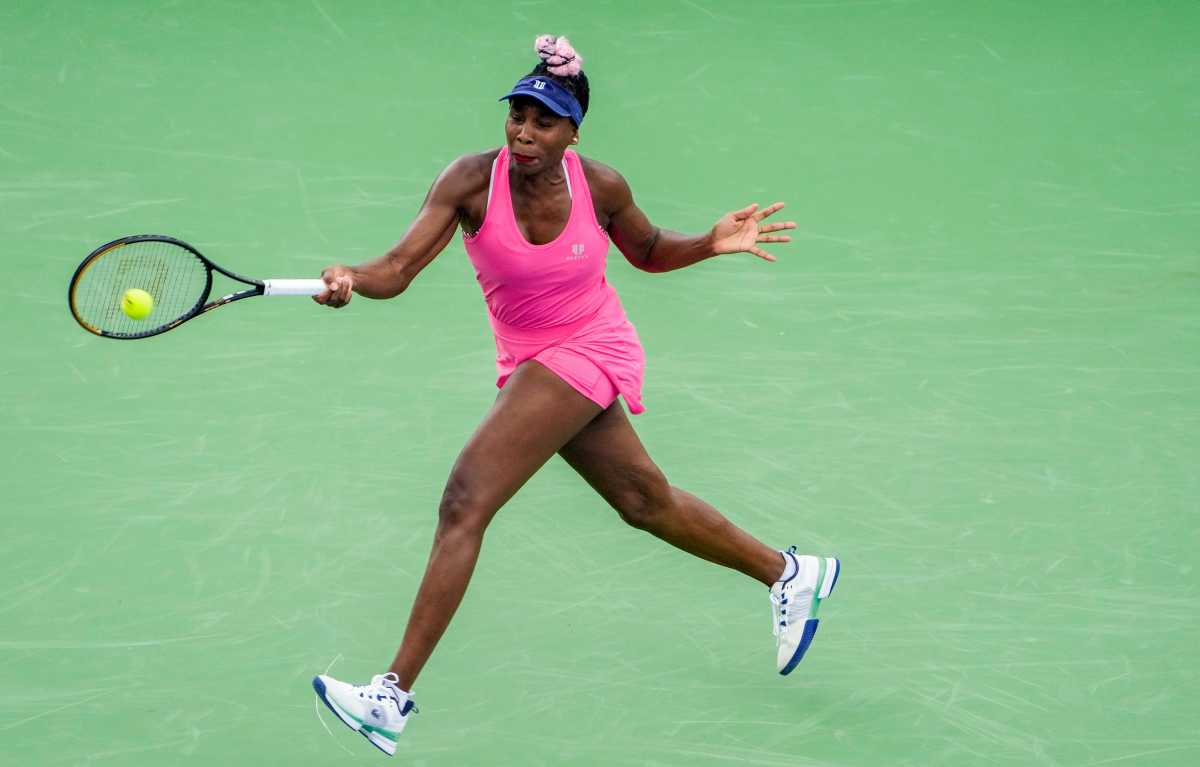 Venus Williams swings at the tennis ball