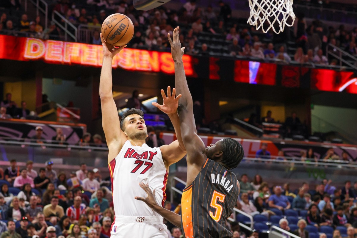 Miami Heat center Omer Yurtseven (77) shoots the ball against Orlando Magic center Mo Bamba (5) during the first quarter at Amway Center.