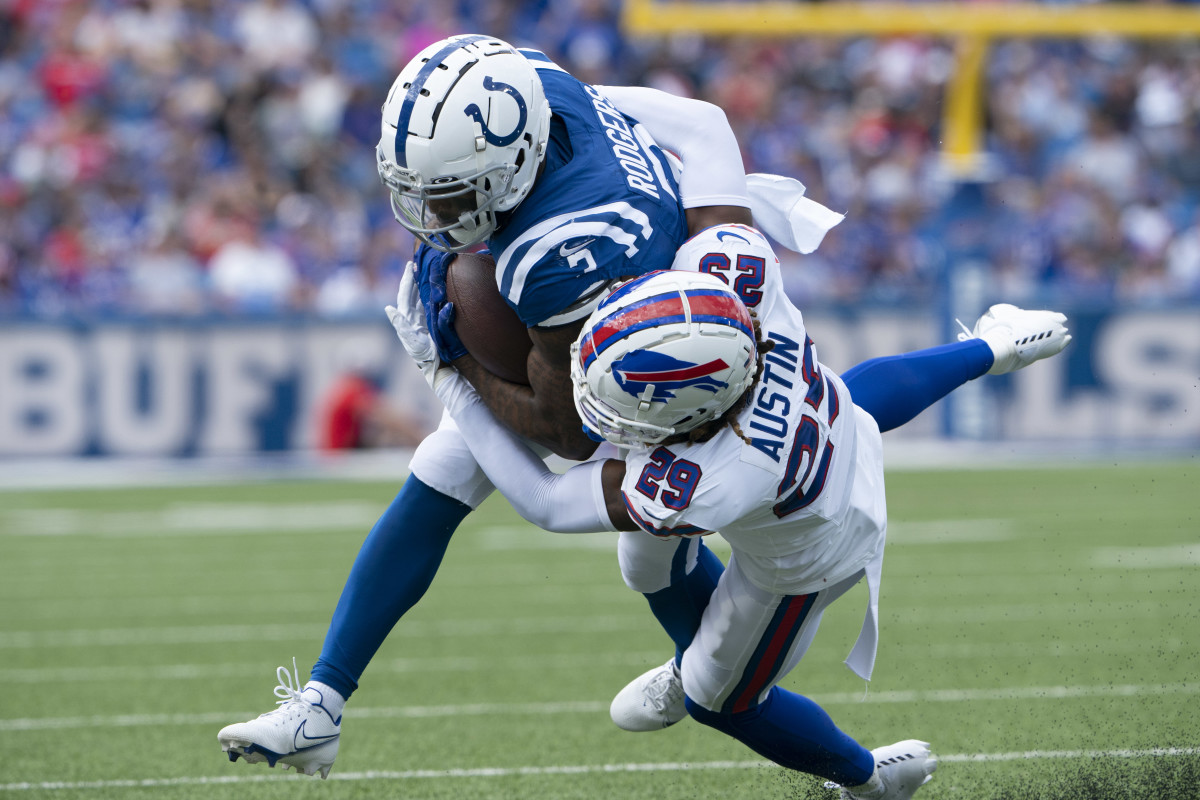 Aug 12, 2023; Orchard Park, New York, USA; Buffalo Bills cornerback Alex Austin (29) tackles Indianapolis Colts wide receiver Amari Rodgers (3) running with the ball during the second half at Highmark Stadium.