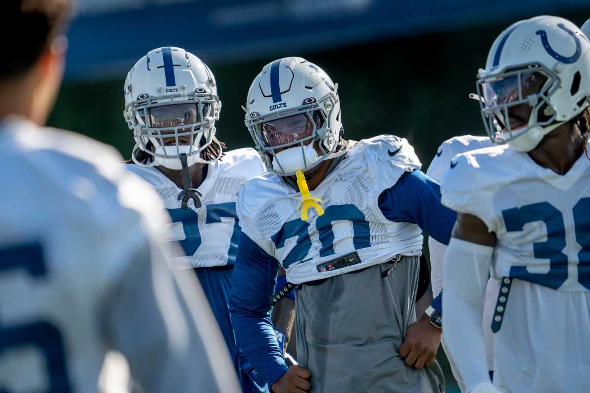Indianapolis Colts players, including safety Nick Cross (20), center, wait for the next play during day #9 practice of Colts Camp, Tuesday, Aug. 8, 2023 at Grand Park in Westfield.  