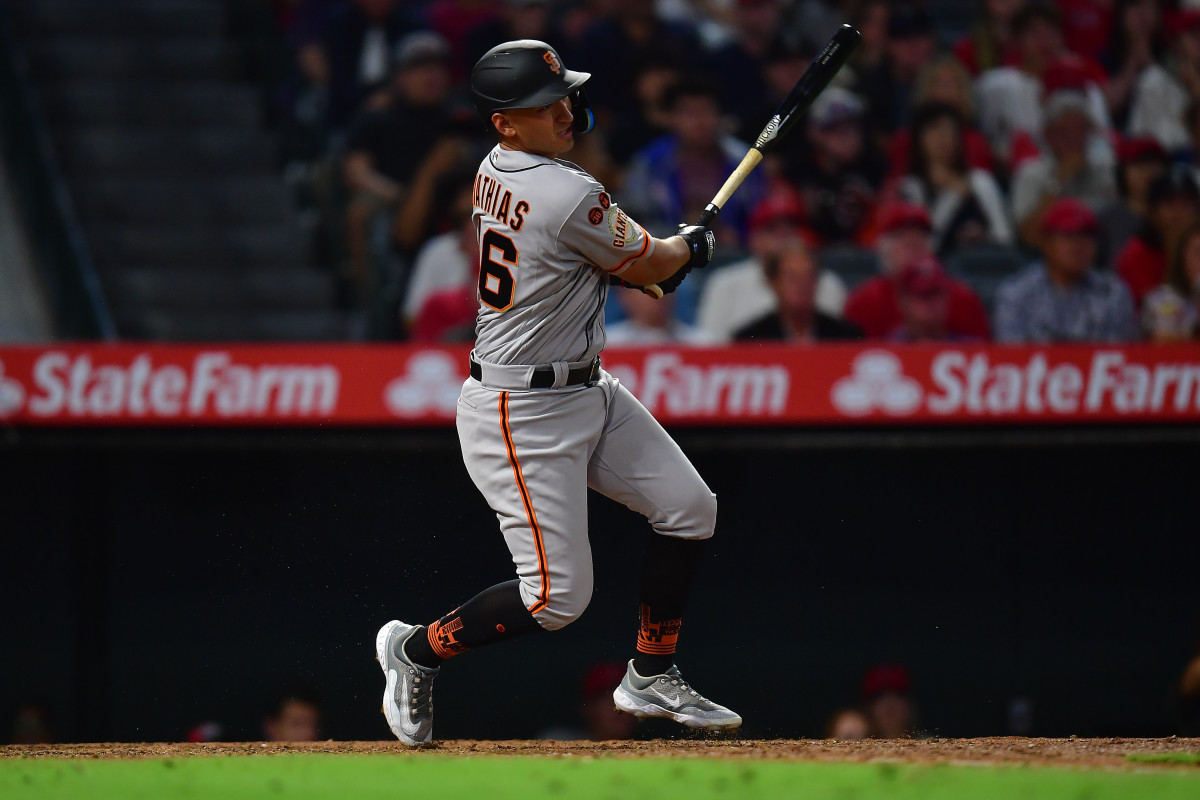 SF Giants second baseman Mark Mathias hits a two-run RBI single against the Los Angeles Angels during the ninth inning at Angel Stadium. (2023)