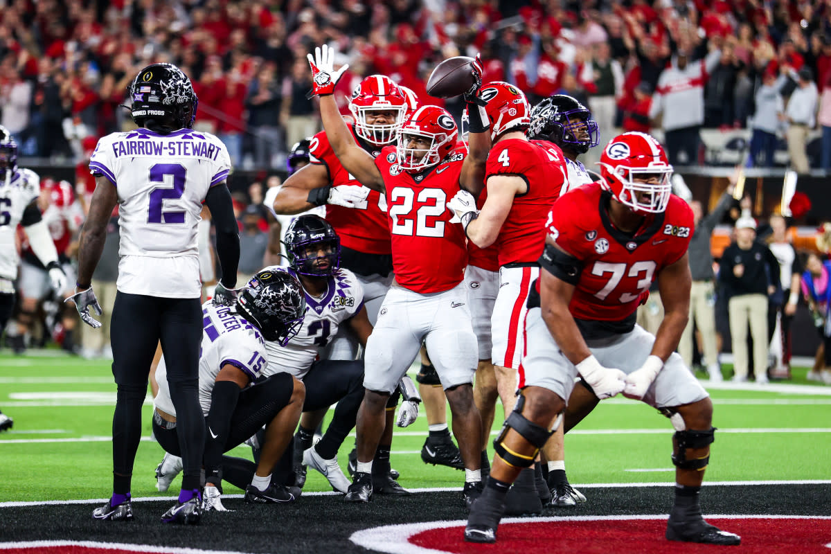 Georgia RB Branson Robinson celebrates a touchdown against TCU in the CFP National Championship Game. Robinson has been ruled out for the season with a ruptured patella tendon.