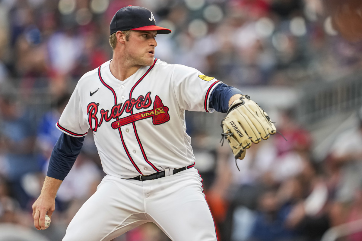 Aug 22, 2023; Cumberland, Georgia, USA; Atlanta Braves starting pitcher Bryce Elder (55) pitches against the New York Mets during the first inning at Truist Park.