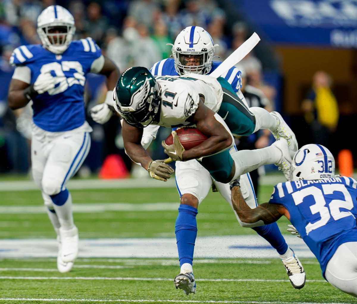 Philadelphia Eagles wide receiver A.J. Brown (11) dives with the ball as Indianapolis Colts safety Julian Blackmon (32) moves in Sunday, Nov. 20, 2022, during a game against the Philadelphia Eagles at Lucas Oil Stadium in Indianapolis.