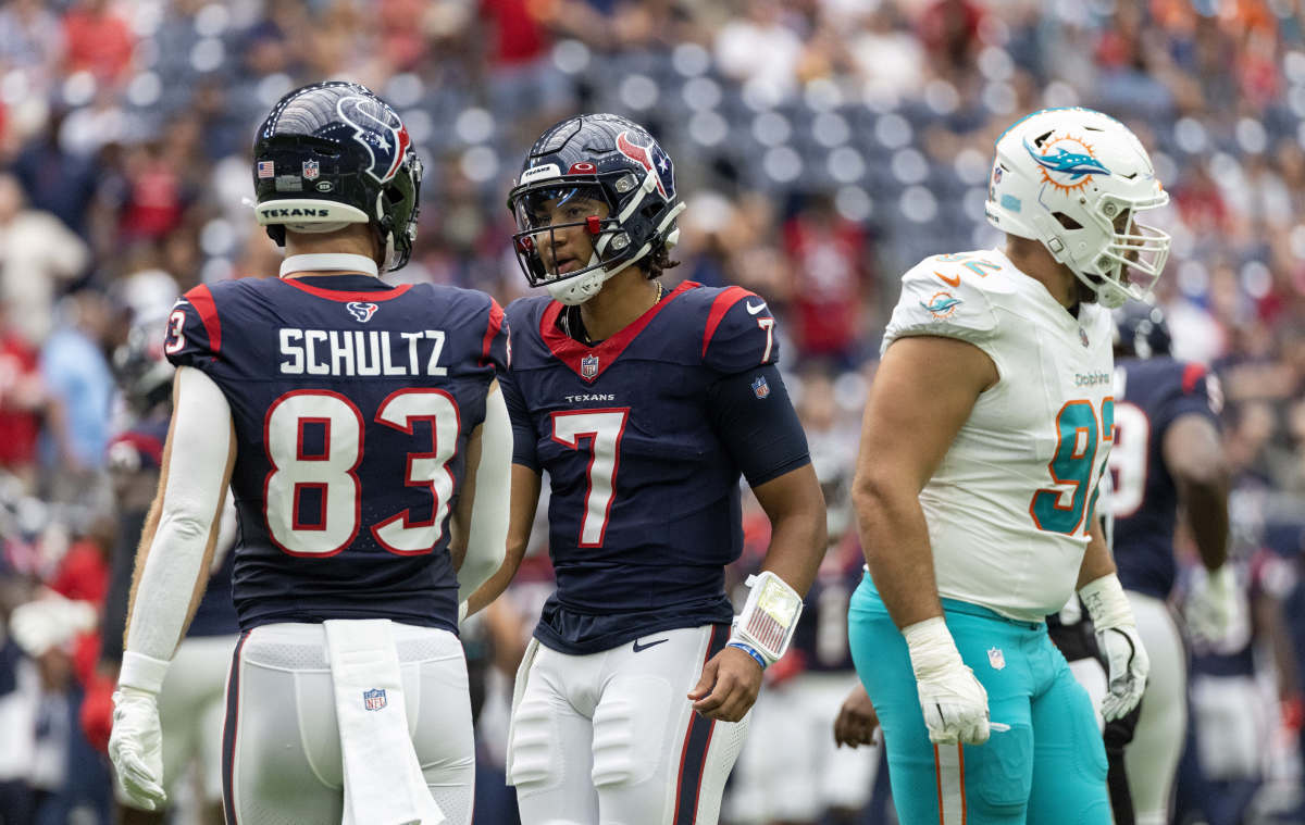 Aug 19, 2023; Houston, Texas, USA; Houston Texans quarterback C.J. Stroud (7) talks with Houston Texans tight end Dalton Schultz (83) after throwing an incomplete pass and turning over the ball on downs in the first quarter at NRG Stadium. Mandatory Credit: Thomas Shea-USA TODAY Sports