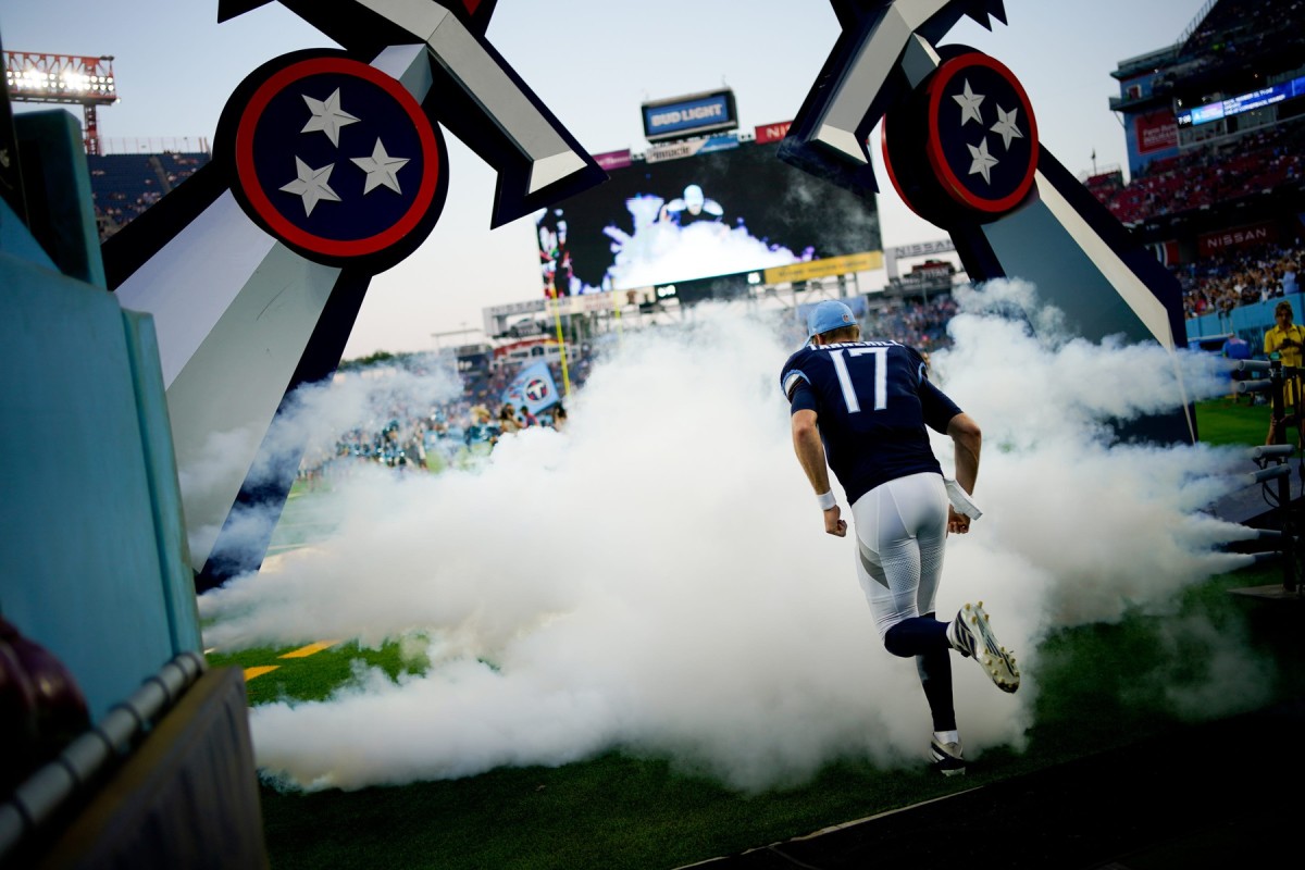 Tennessee Titans quarterback Ryan Tannehill (17) runs on to the field to play the New England Patriots at Nissan Stadium.