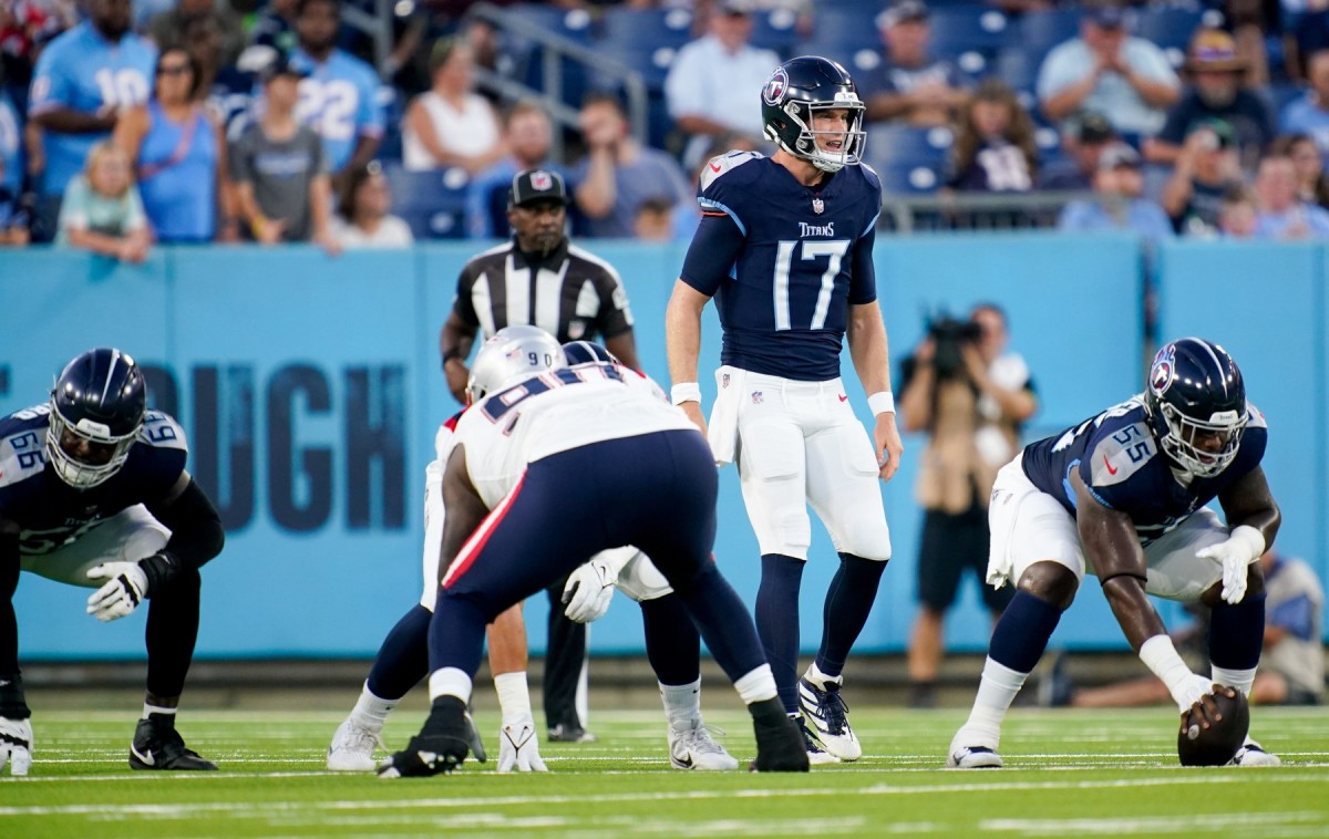 Tennessee Titans quarterback Ryan Tannehill (17) calls a play to his team as they face the New England Patriots at Nissan Stadium.