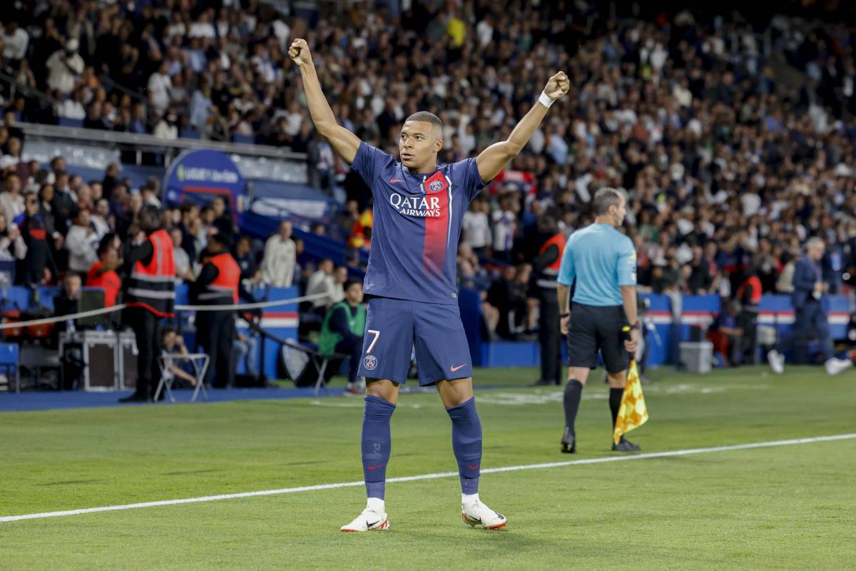 Kylian Mbappe pictured celebrating after scoring a goal during PSG's 3-1 win over Lens in August 2023
