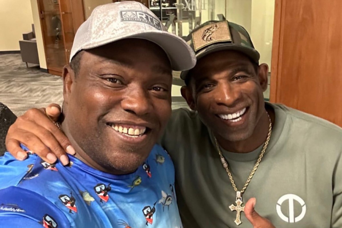 Warren Sapp poses with Deion Sanders at the University of Colorado
