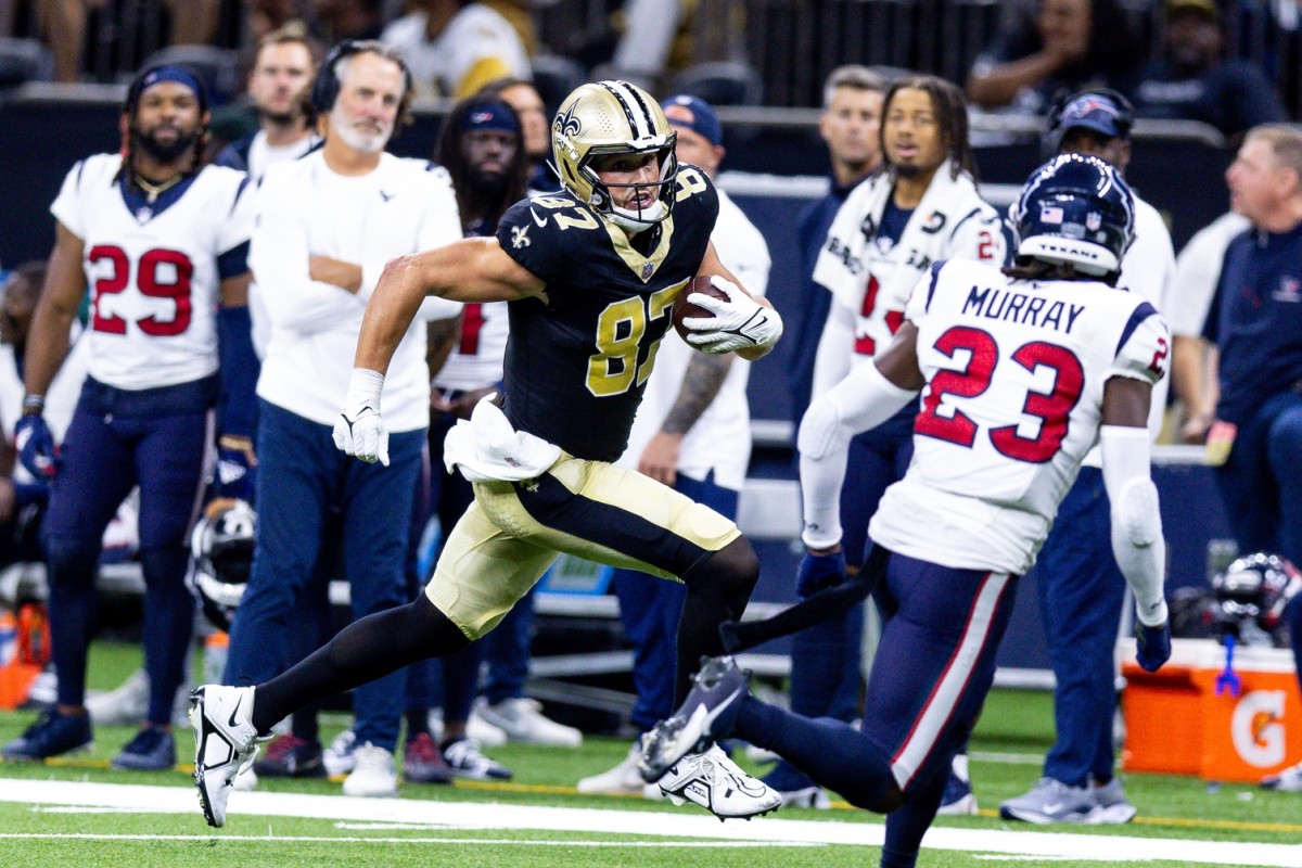 New Orleans Saints tight end Lucas Krull (87) catches a pass against Houston Texans safety Eric Murray (23). Mandatory Credit: Stephen Lew-USA TODAY