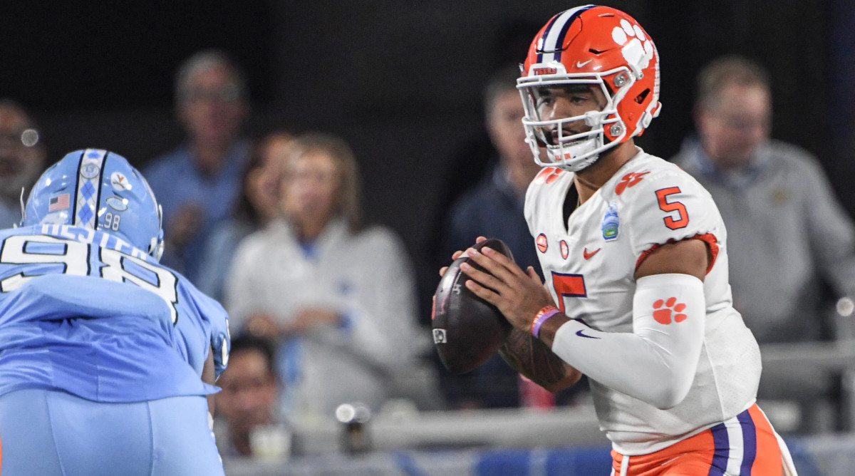DJ Uiagalelei holds the ball preparing to throw while quarterback for the Clemson Tigers.