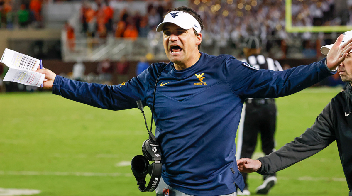 West Virginia football coach Neal Brown complains about a call vs. Oklahoma State.