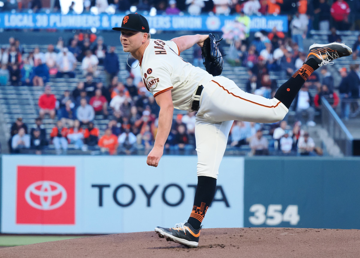 SF Giants starting pitcher Kyle Harrison pitches the ball against the Cincinnati Reds during the first inning at Oracle Park on August 28, 2023.