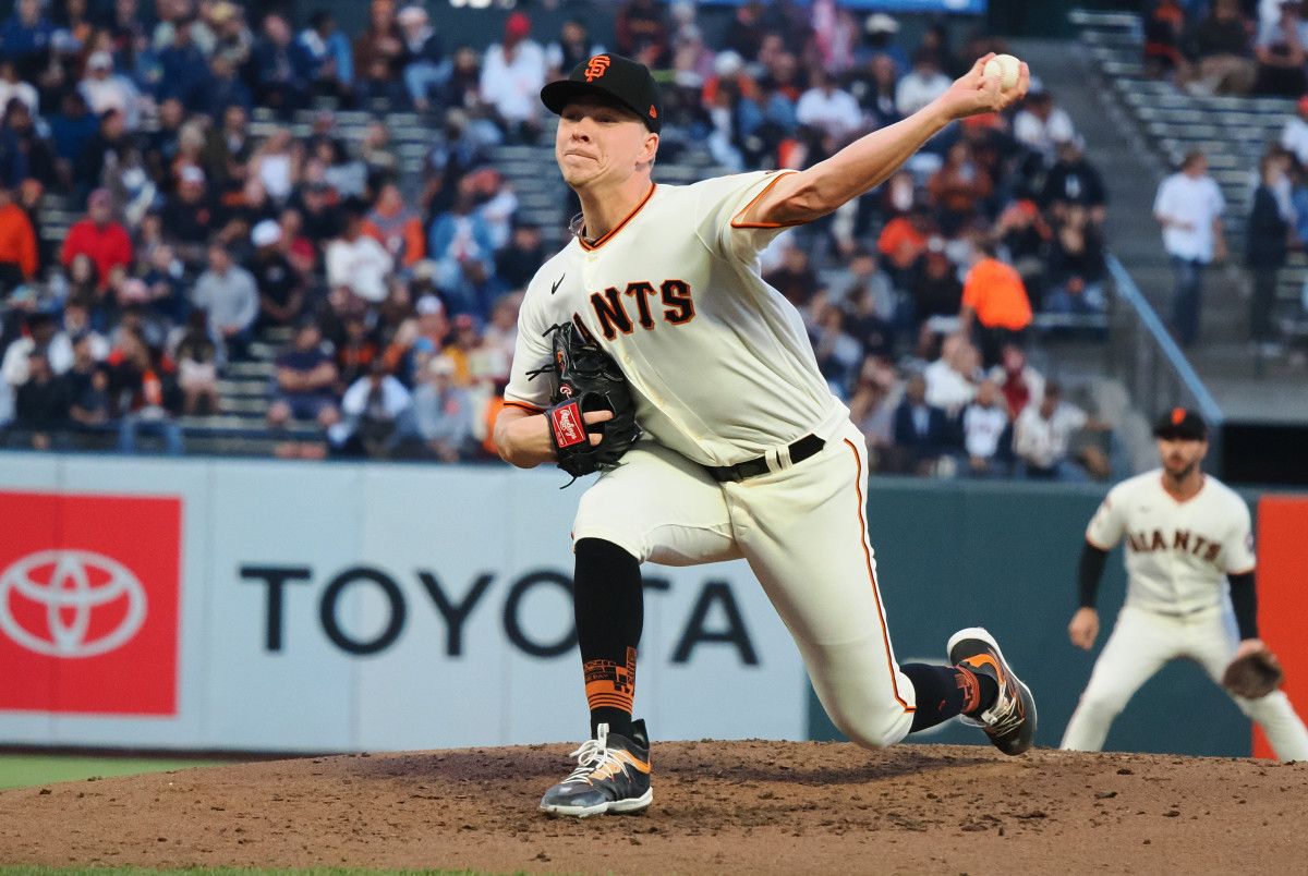 SF Giants starting pitcher Kyle Harrison throws a pitch against the Cincinnati Reds during the third inning at Oracle Park on August 28, 2023.