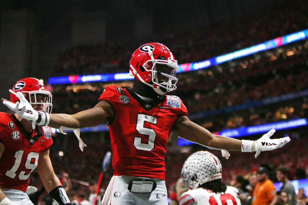 Georgia Bulldogs wide receiver Adonai Mitchell celebrates after making a catch for a touchdown