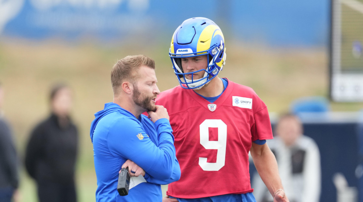 Rams coach Sean McVay confers with quarterback Matthew Stafford during the team’s 2023 minicamp.