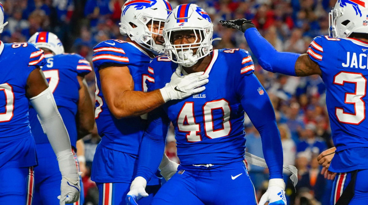 Sep 19, 2022; Orchard Park, New York, USA; Buffalo Bills linebacker Von Miller (40) and Buffalo Bills linebacker Matt Milano (58) react to making a play during the first half against the Tennessee Titans at Highmark Stadium. Mandatory Credit: Gregory Fisher-USA TODAY Sports