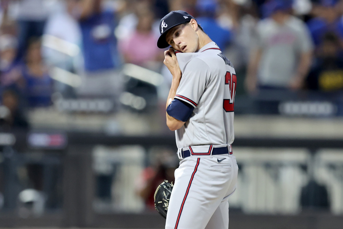 Aug 4, 2022; New York City, New York, USA; Atlanta Braves starting pitcher Kyle Wright (30) reacts during the third inning against the New York Mets at Citi Field.