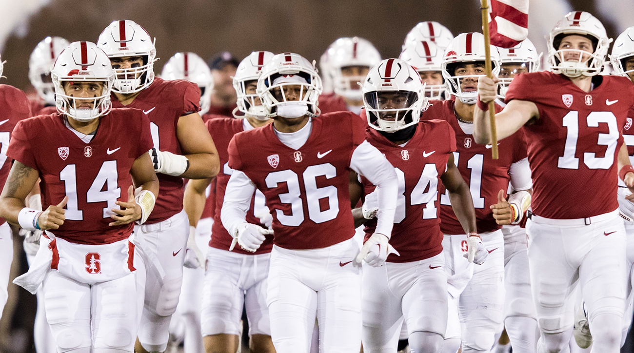 Stanford Cardinal football team runs out of the tunnel for game vs. BYU.