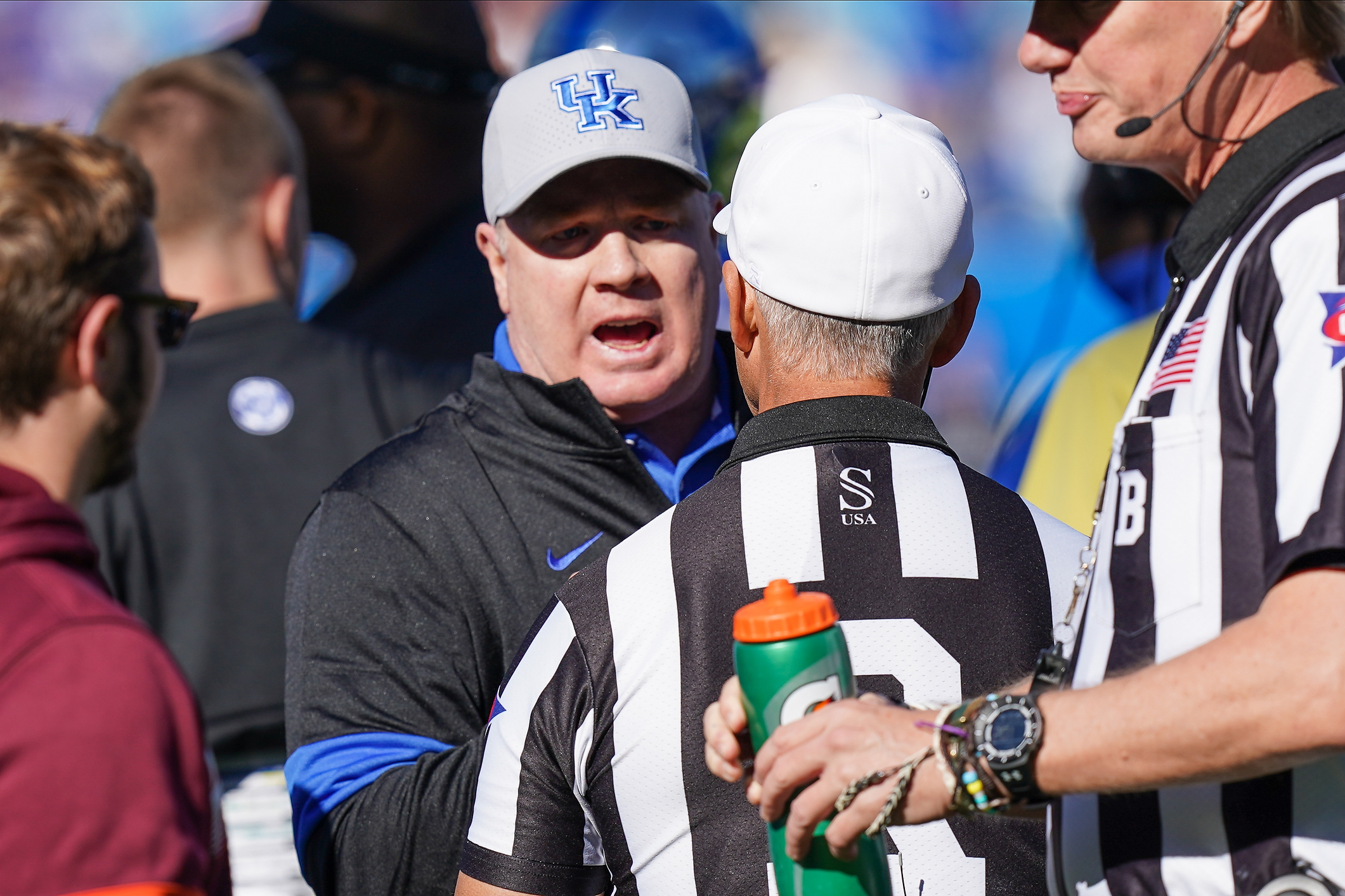 Dec 31, 2019; Charlotte, North Carolina, USA; Kentucky Wildcats head coach Mark Stoops argues a call with the official during the second quarter against the Virginia Tech Hokies of the Belk Bowl at Bank of America Stadium. Mandatory Credit: Jim Dedmon-USA TODAY Sports