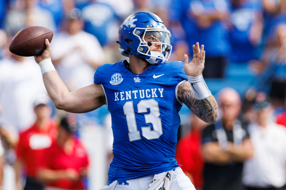 Sep 2, 2023; Lexington, Kentucky, USA; Kentucky Wildcats quarterback Devin Leary (13) throws a pass during the first quarter against the Ball State Cardinals at Kroger Field. Mandatory Credit: Jordan Prather-USA TODAY Sports