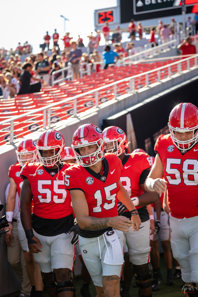 Georgia QB Carson Beck (15) leads his team out of the tunnel ahead of his first collegiate start against UT-Martin inside Sanford Stadium on Saturday, Sep. 2.