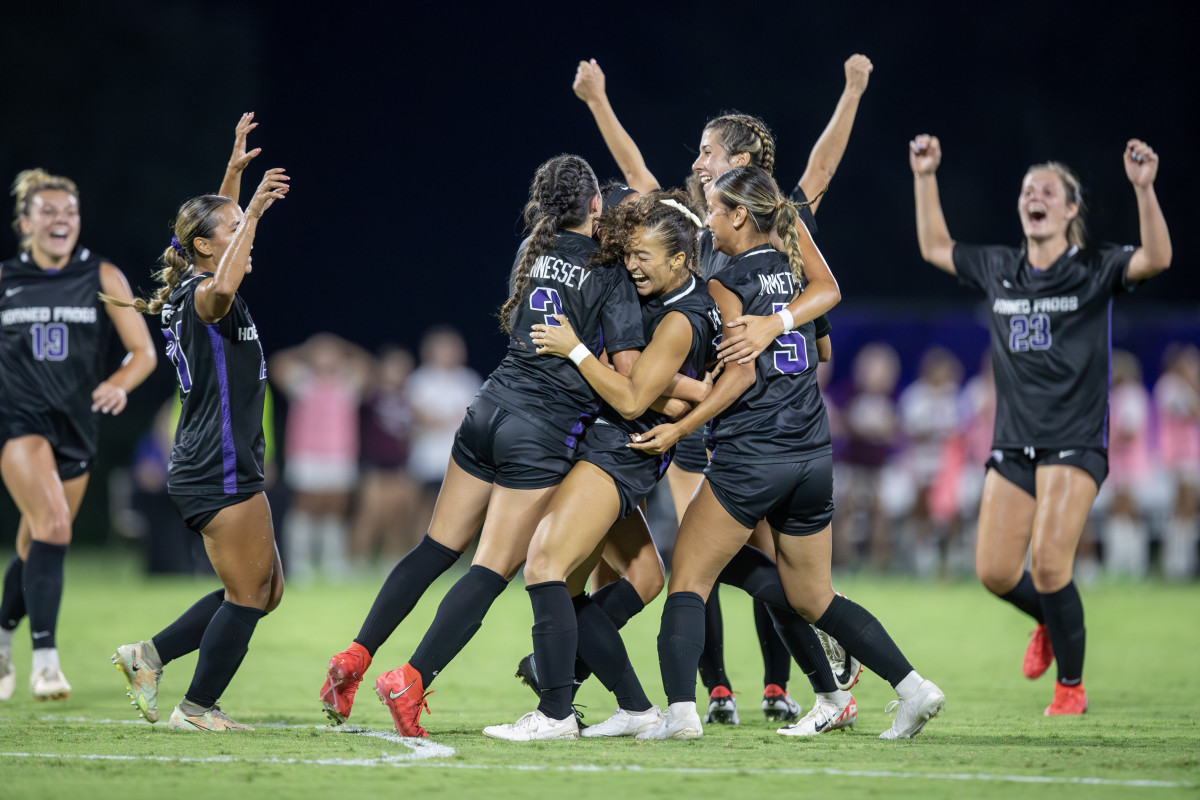 The Horned Frogs celebrate Seven Castain's game-winning goal in the 87th minute.