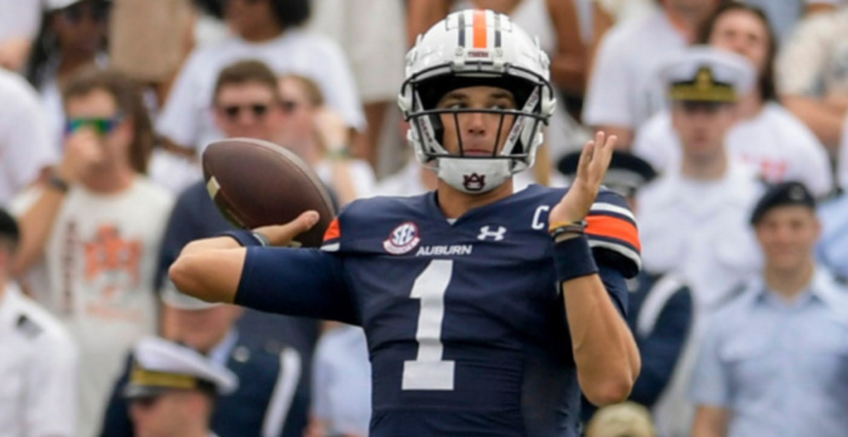 Auburn Tigers quarterback Payton Thorne throws a pass during a college football game in the SEC.