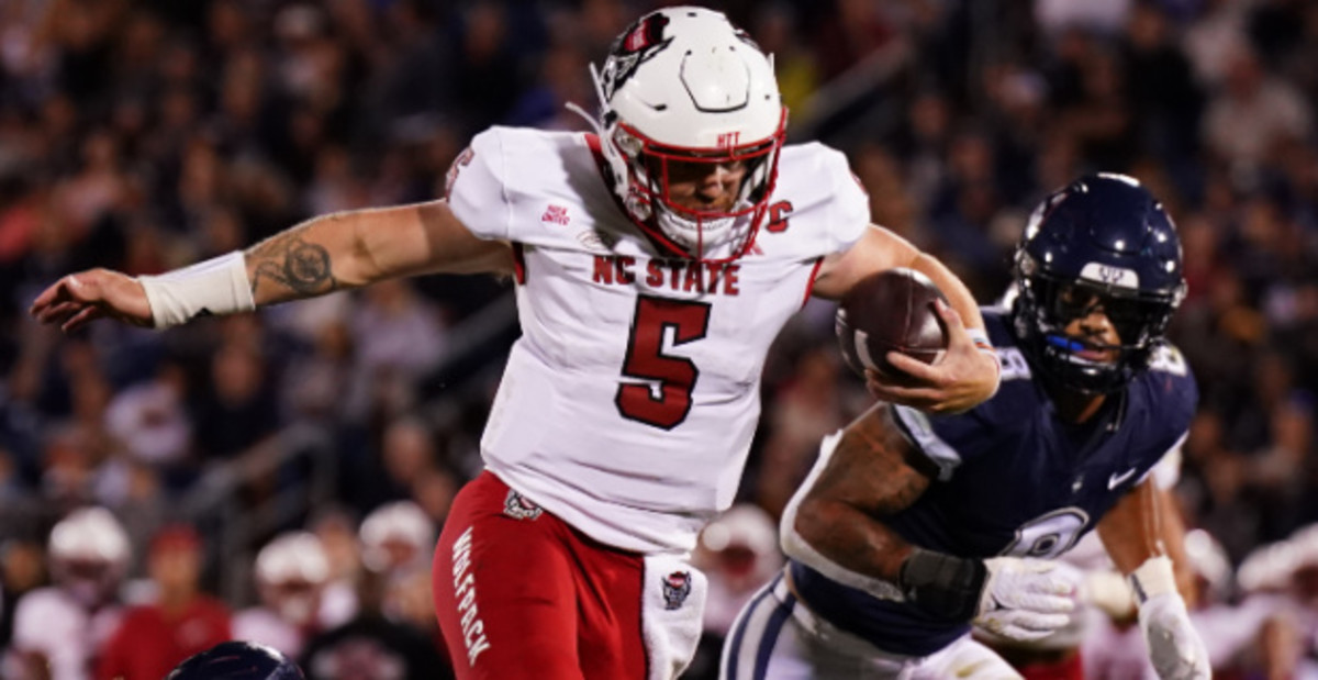 NC State Wolfpack quarterback Brennan Armstrong on a carry during a college football game on the ACC schedule.