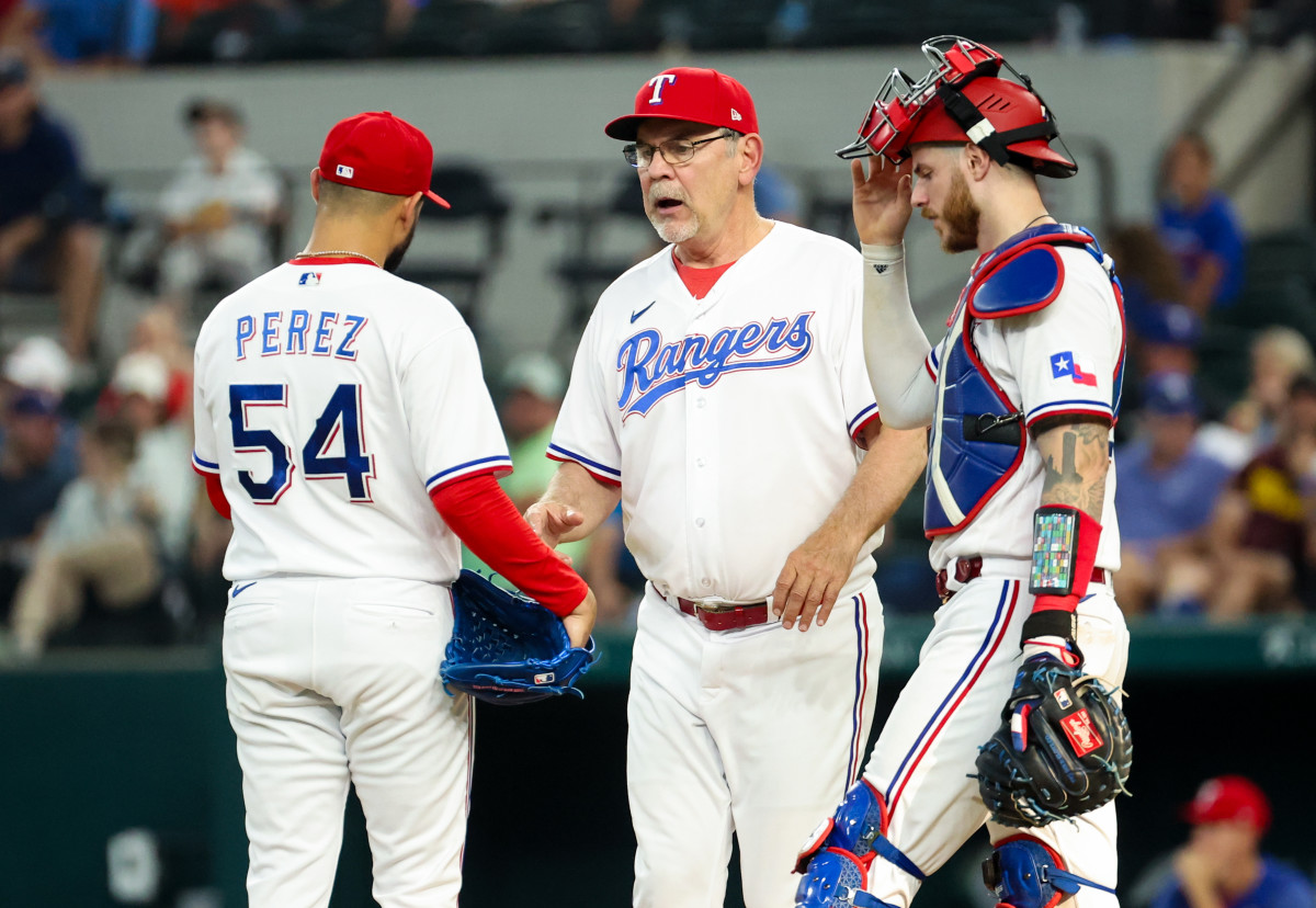 Sep 4, 2023; Arlington, Texas, USA; Texas Rangers manager Bruce Bochy (15) removes Texas Rangers starting pitcher Martin Perez (54) during the ninth inning against the Houston Astros at Globe Life Field. Mandatory Credit: Kevin Jairaj-USA TODAY Sports