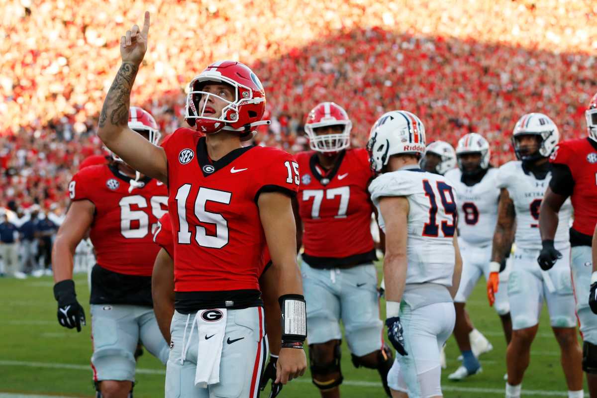 Georgia starting QB Carson Beck celebrates after running for a touchdown in the second quarter of Georgia's season-opening win over UT-Martin. 