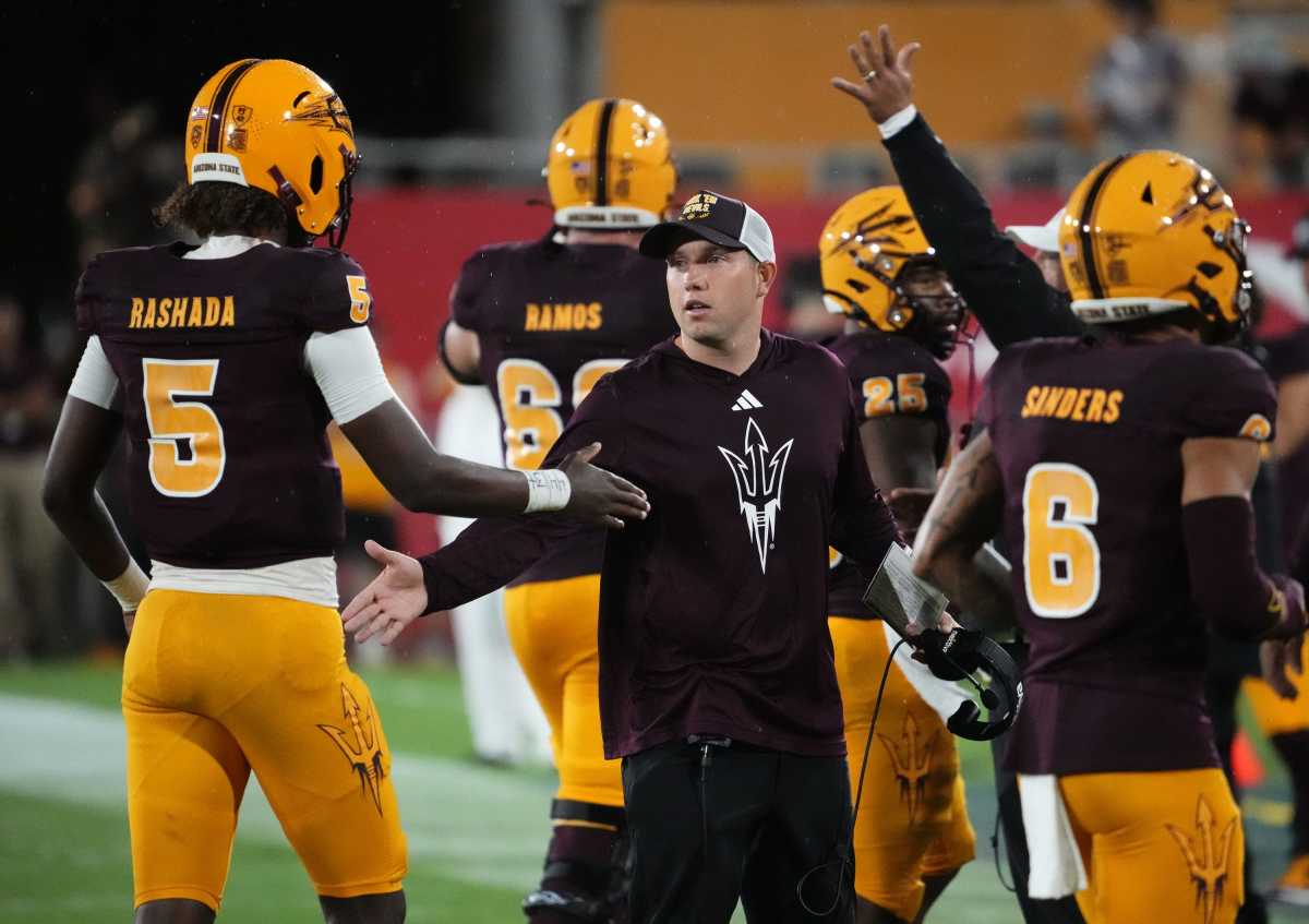 Arizona State head coach Kenny Dillingham greets quarterback Jaden Rashada (5) during action against the Southern Utah Thunderbirds in the second half at Mountain America Stadium in Tempe on Sept. 1, 2023.