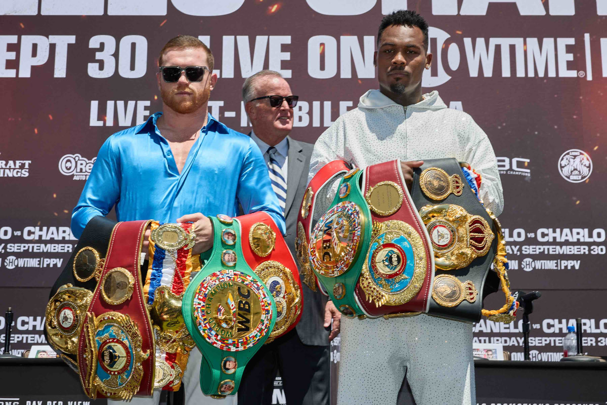 Undisputed boxing champions Canelo Alvarez and Jermell Charlo pose ahead of their September 30 title fight.