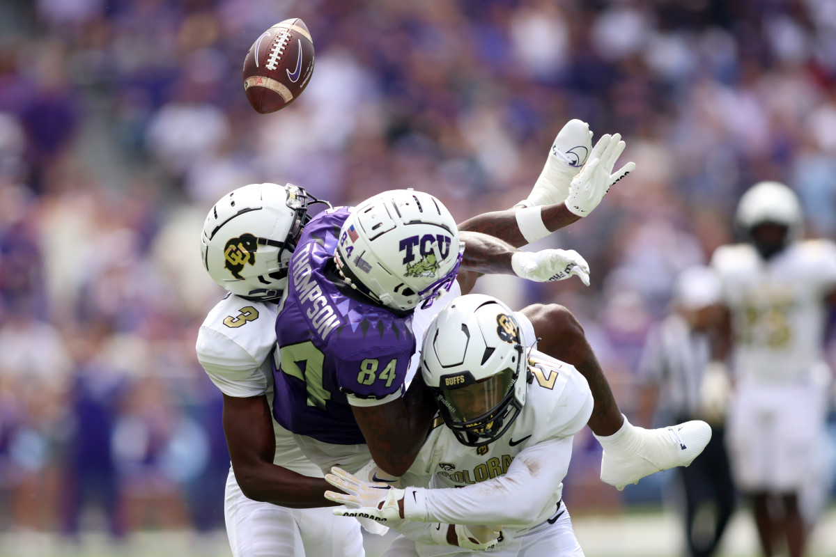 Colorado Buffaloes cornerback Omarion Cooper (3) and safety Shilo Sanders (21) defend a pass against TCU Horned Frogs wide receiver Warren Thompson (84) in the second quarter at Amon G. Carter Stadium