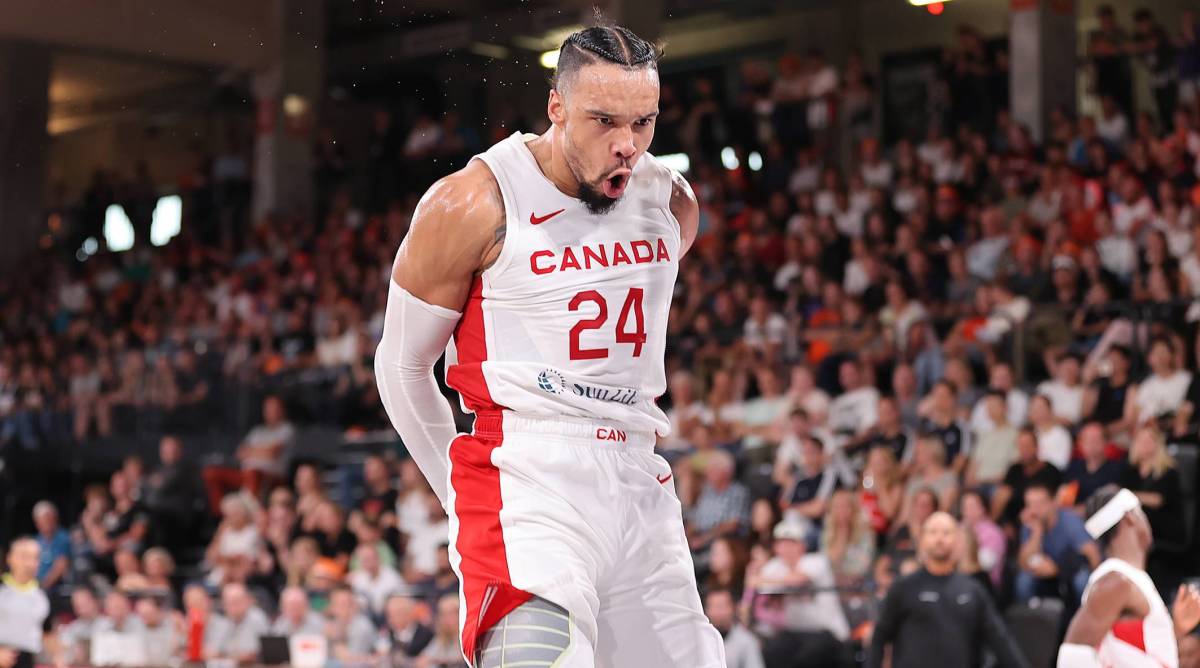 Dillon Brooks reacts after dunking a ball while playing for Team Canada in the FIBA World Cup.