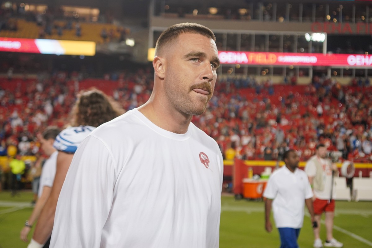 Chiefs tight end Travis Kelce walks off the field after Kansas City's loss to the Lions in the NFL opener. Kelce was sidelined due to a knee injury.