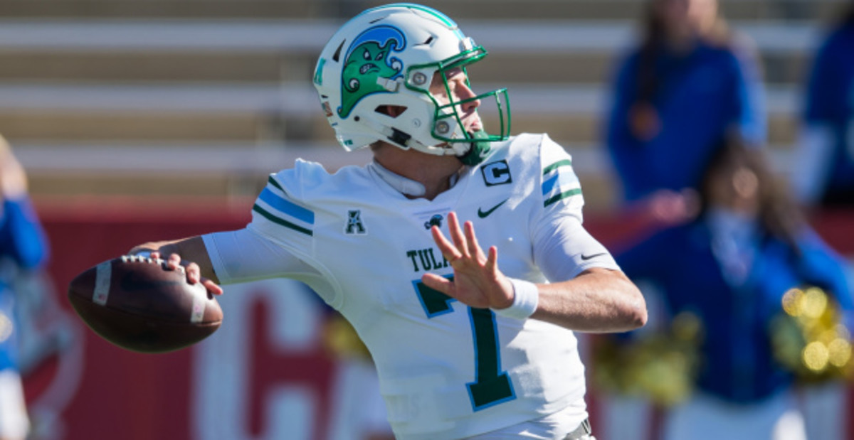 Tulane quarterback Michael Pratt attempts a pass during a college football game in the AAC.