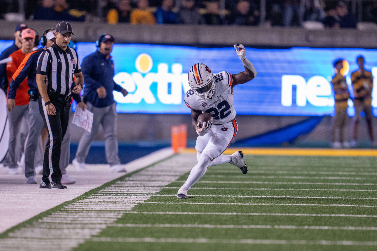 Sep 9, 2023; Berkeley, California, USA; Auburn Tigers running back Damari Alston (22) runs with the football after the catch during the second quarter against the California Golden Bears at California Memorial Stadium. Mandatory Credit: Neville E. Guard-USA TODAY Sports  