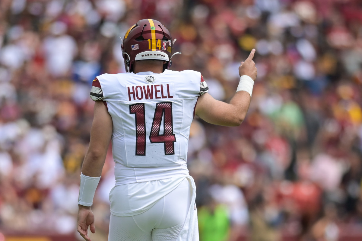 Sep 10, 2023; Landover, Maryland, USA; Washington Commanders quarterback Sam Howell (14) signals first down during the first quarter against the Arizona Cardinals at FedExField. Mandatory Credit: Tommy Gilligan-USA TODAY Sports