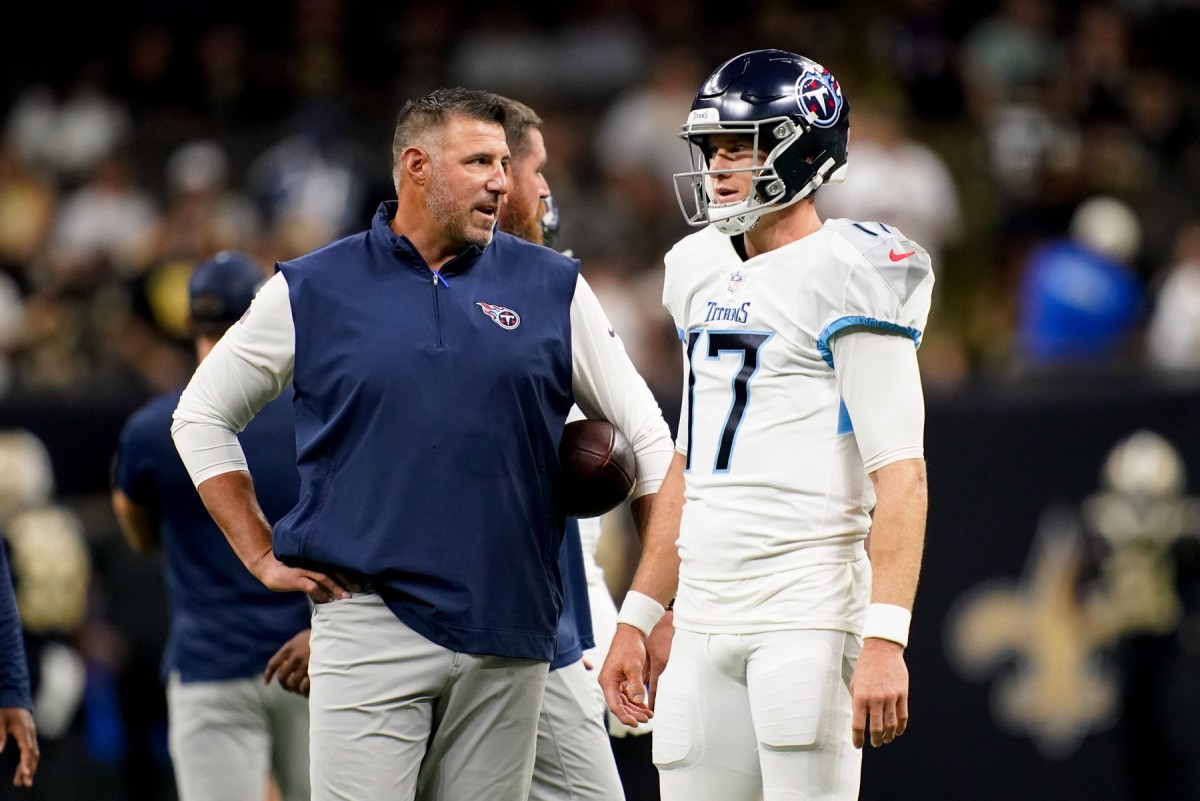 Tennessee Titans head coach Mike Vrabel and quarterback Ryan Tannehill (17) talk on the field as the team gets ready to face the New Orleans Saints at the Caesars Superdome.
