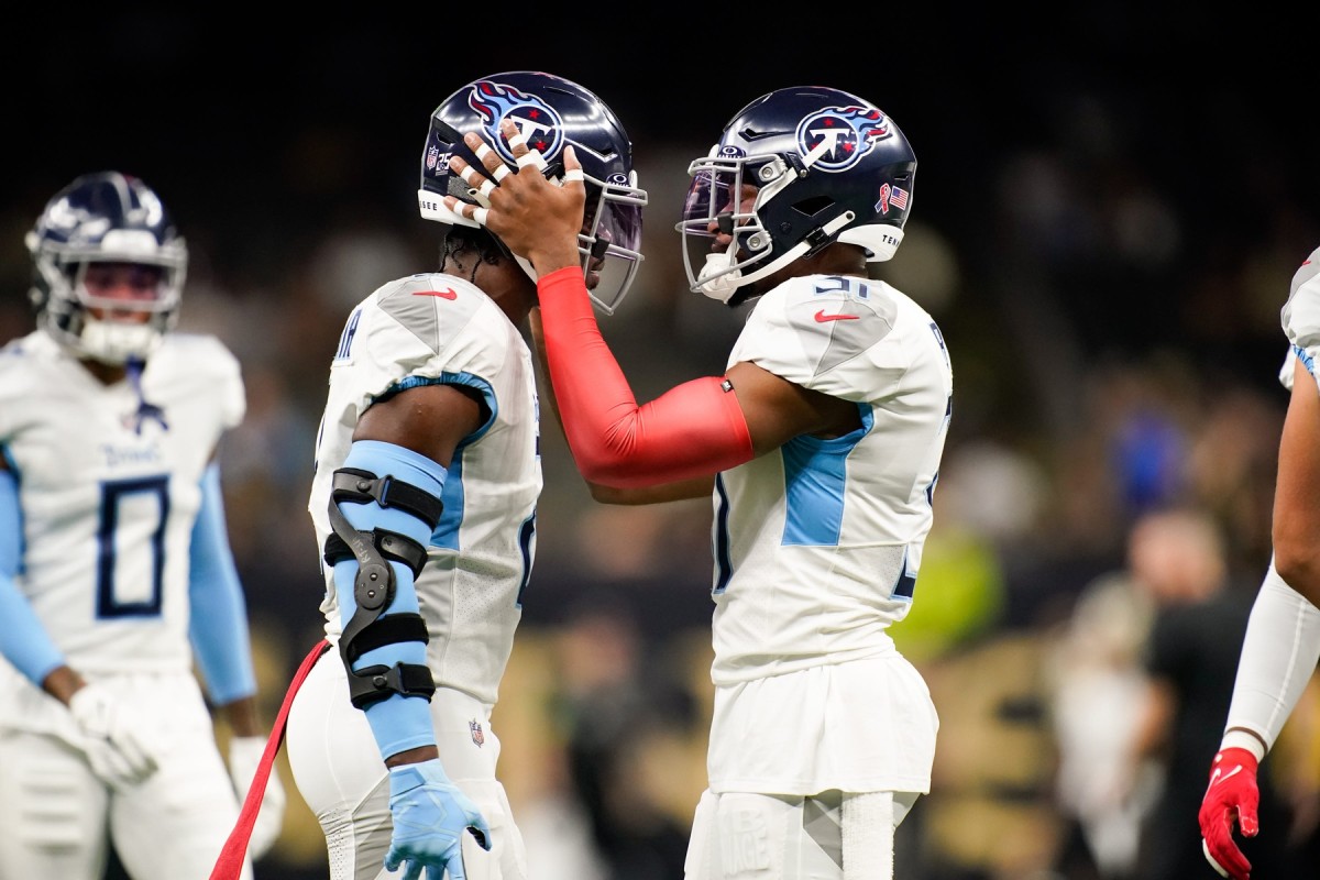 Tennessee Titans linebacker Azeez Al-Shaair (2) and safety Kevin Byard (31) talk on the field as the team gets ready to face the New Orleans Saints at the Caesars Superdome.